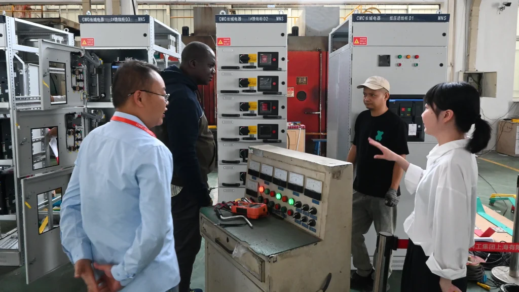 CMC Electric engineers demonstrating MNS low-voltage switchgear to Gabonese technical personnel during equipment training